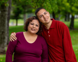 Teen boy with Autism hugs his mom sweetly