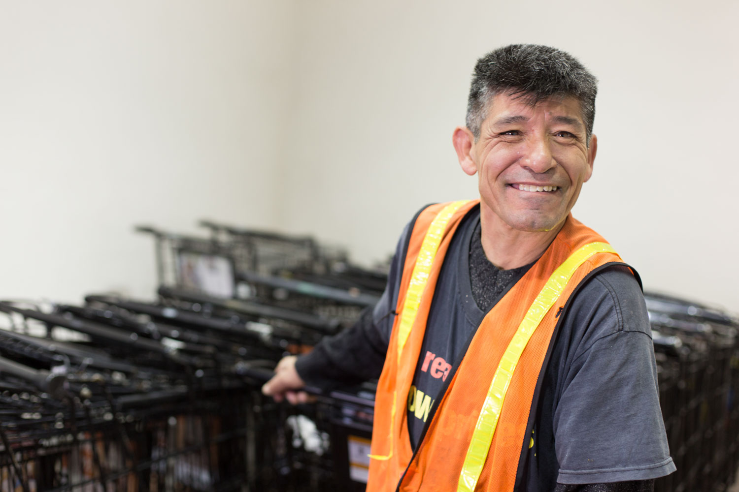 Luis on the job at Ralphs putting shopping carts back